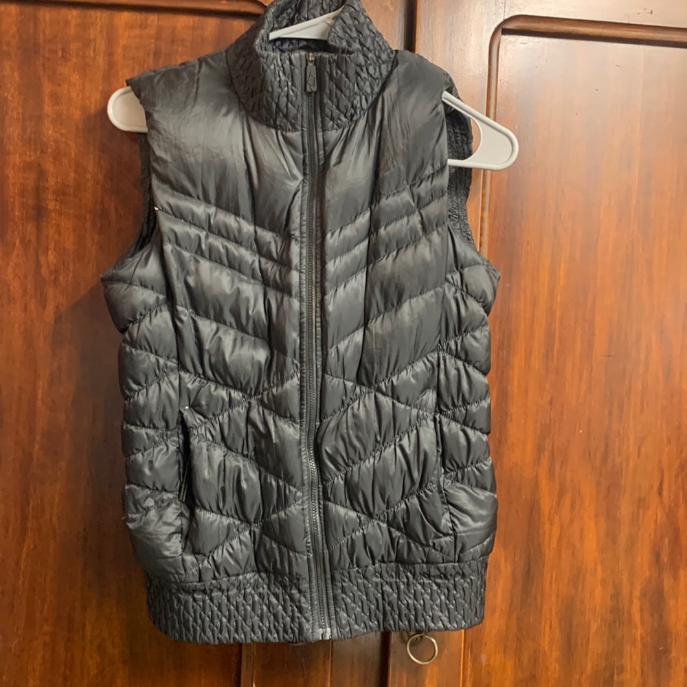 Nike black quilted down puffer vest. Size s